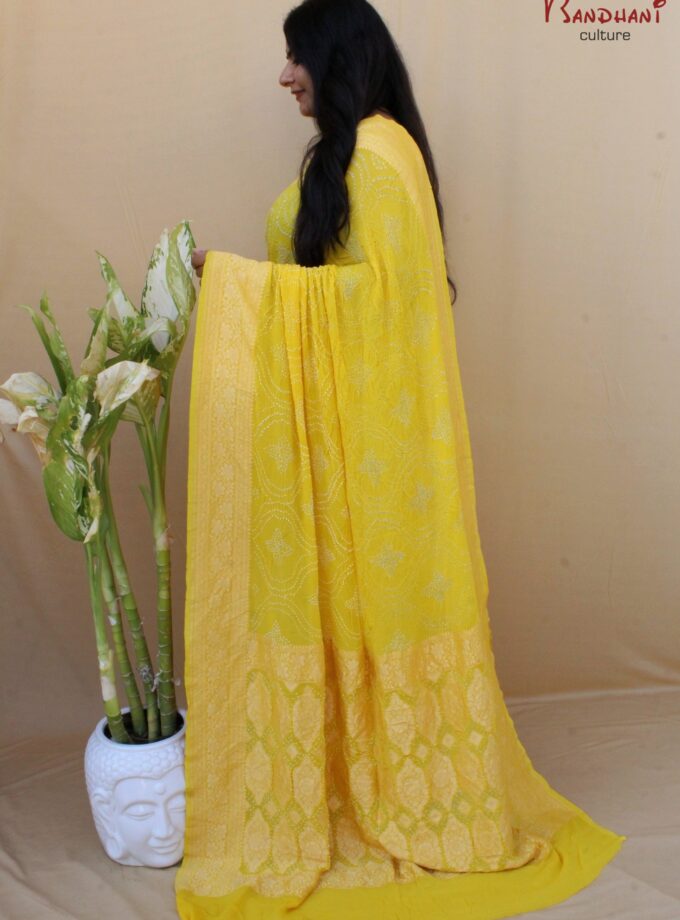 Yellow Border Pallu Neemjari Bandhej Saree